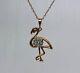 10k Rose Gold. 09tw White Sapphire. 8 Flamingo Pendant On Prince Of Wales Chain