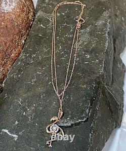 10K Rose Gold. 09TW White Sapphire. 8 Flamingo Pendant on Prince of Wales Chain